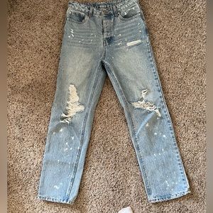 Distressed light denim jeans with bleach spots. Size 5. No boundaries brand.